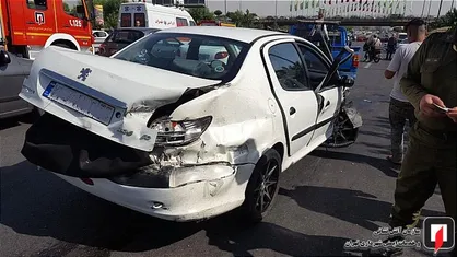 نجات راننده جوان از کانال آب +عکس
